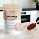 Not Coffee Hazelnut Instant — dosing into glass lifestyle image