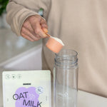 Scooping Nimbus Oat Milk powder