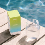 Sodii Salty Citrus hydration salts with water by the pool