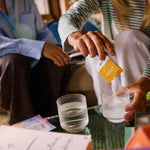 Sodii Salty Pineapple hydration salts poured into water
