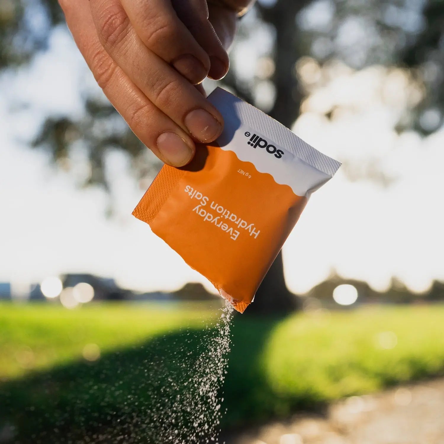 Sodii Salty Mandarin electrolyte powder poured outdoors