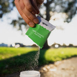 Sodii Salty Kiwi electrolyte powder poured outdoors