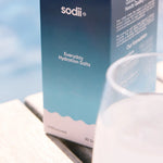 Sodii Unflavoured hydration salts with glass of water