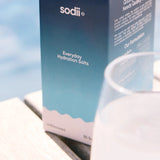 Sodii Unflavoured hydration salts with glass of water