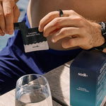 Sodii Unflavoured electrolyte sachet being opened