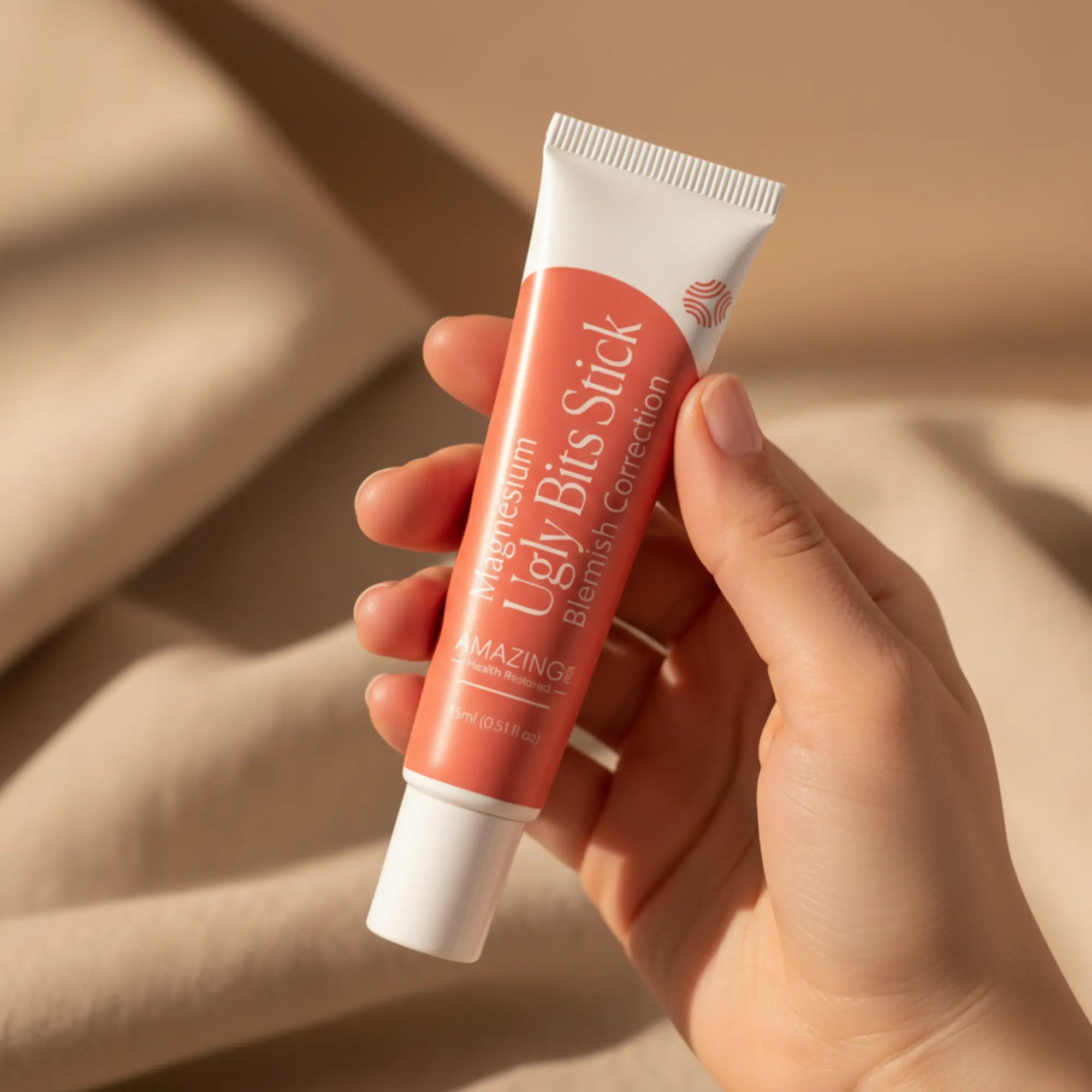 Amazing You Ugly Bits Stick lifestyle - hand holding product