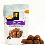 Byron Bay Cookie Company Gluten Free Triple Choc Cookie Bites 100g — product lifestyle image