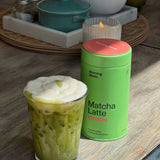 Morning Made Strawberry Matcha Latte — official canister and prepared iced matcha lifestyle image