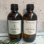 Vrindavan Castor Oil and Rosemary Amber Glass Bottle 200ml in Vrindavan styled product scene