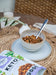 the monday food co keto gourmet granola sweet crunchy macadamia clusters